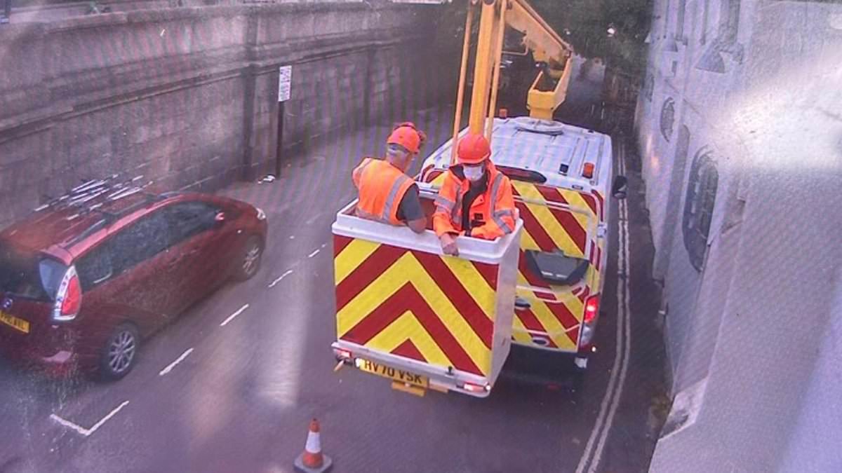 Moment Banksy is CAUGHT: CCTV ‘shows guerilla artist’ creating his latest masterpiece as he uses…