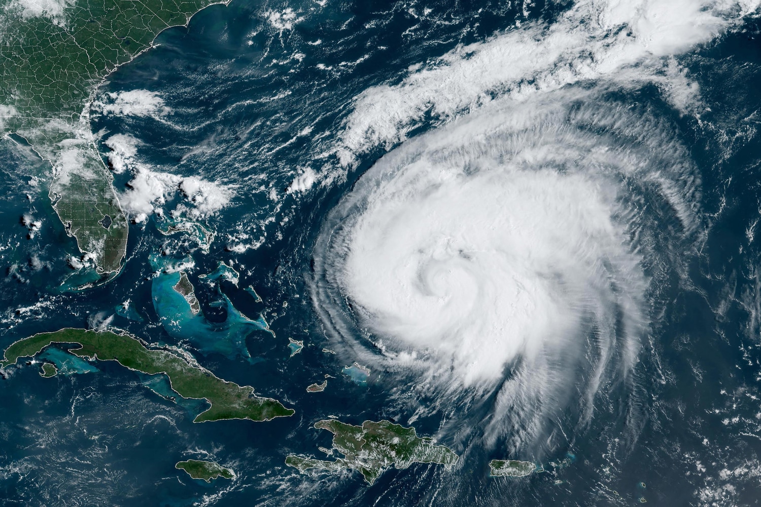 Hurricane Ernesto weakens, but still dangerous, as it closes in on Bermuda