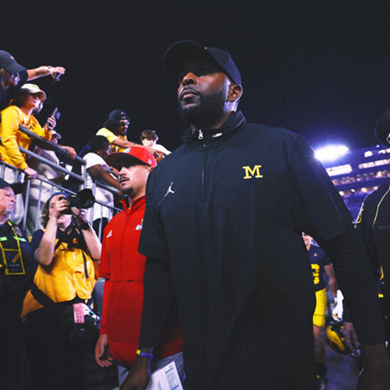 Michigan’s Sherrone Moore has been coaching without a signed contract