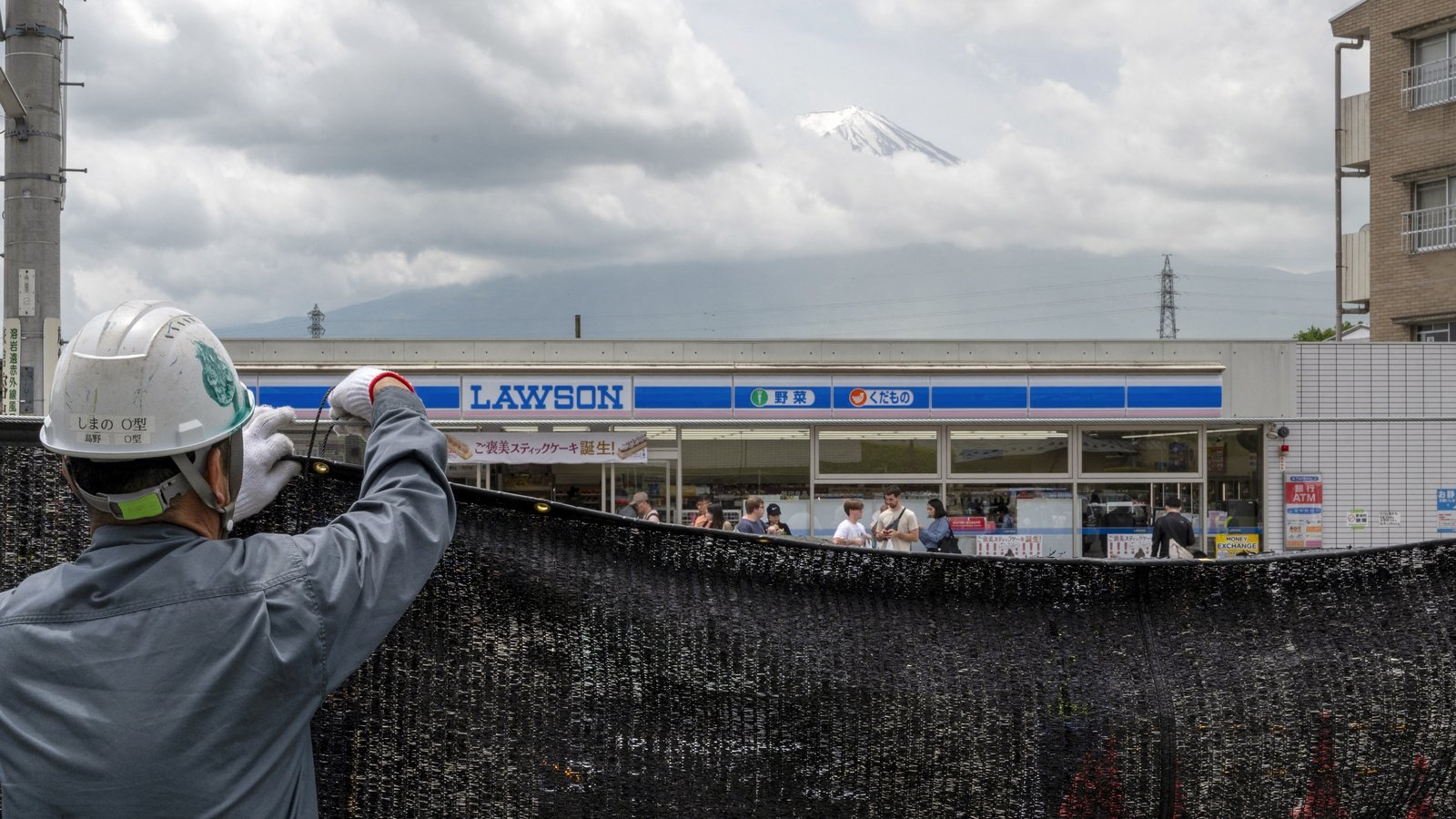 With tourists away, Mt Fuji barrier taken down in Japan